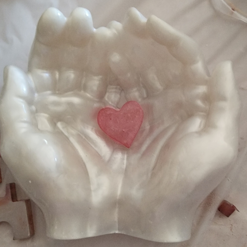 White Hand Sculpture with pink Heart